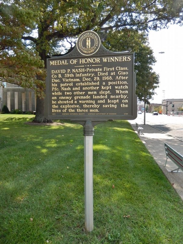 Medal of Honor Winners Marker (<i>side 2; tall view; looking south along Frederica Street</i>) image. Click for full size.