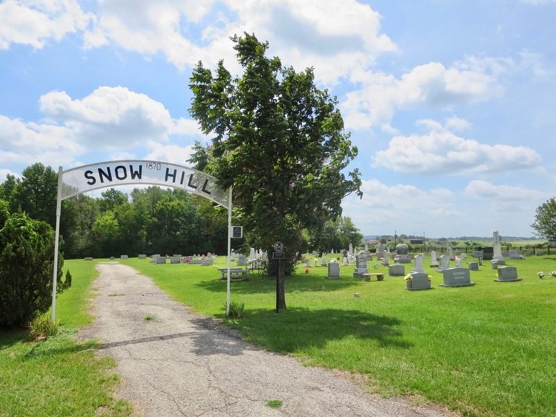 Snow Hill Cemetery next to church. image. Click for full size.