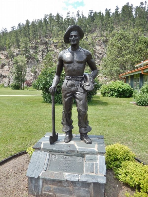 "Work Call" Marker (<i>tall view; showing "CCC Boy" statue above marker</i>) image. Click for full size.