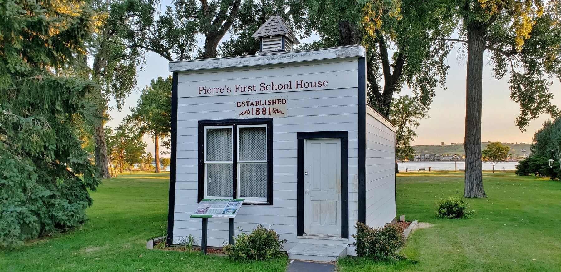 Pierre's First School Marker (<i>wide view; marker located in front of school, under window</i>). Click for full size. Pierre's First School Marker (<i>wide view; marker located in front of school, under window</i>) image. Click for full size.
