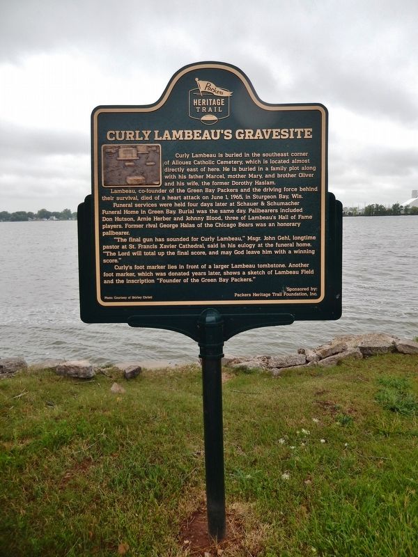 Curly Lambeau's Gravesite Marker (<i>tall view from Fox River Trail; Rox River in background</i>) image. Click for full size.