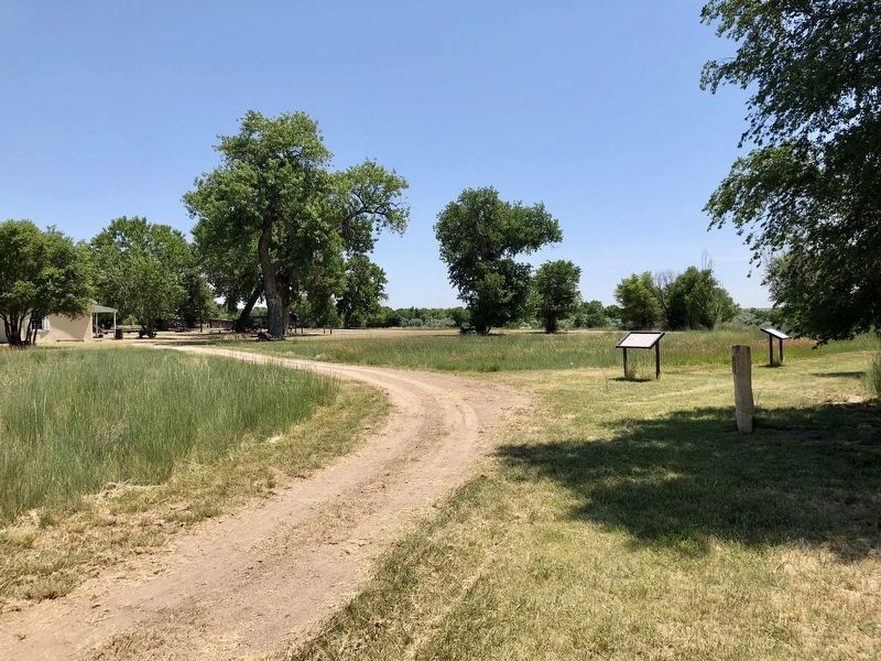 Marker is seen in distance, as well as some buildings of Boggsville. image. Click for full size.