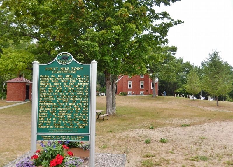 Forty Mile Point Lighthouse (<i>marker side 1; wide view; oil house & lighthouse in background</i>). Click for full size. Forty Mile Point Lighthouse (<i>marker side 1; wide view; oil house & lighthouse in background</i>) image. Click for full size.