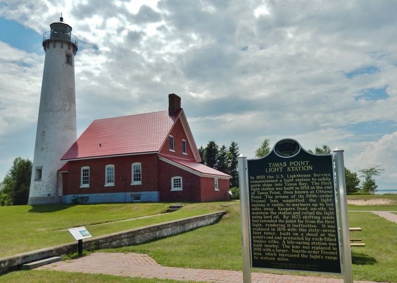 Tawas Point Light Station Marker (<i>side 1; wide view looking east; lighthouse in background</i>) image. Click for full size.