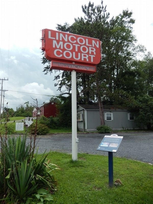 From Motor Camping to Tourist Cabins Marker (<i>tall view; marker beside Motor Court sign</i>). Click for full size. From Motor Camping to Tourist Cabins Marker (<i>tall view; marker beside Motor Court sign</i>) image. Click for full size.
