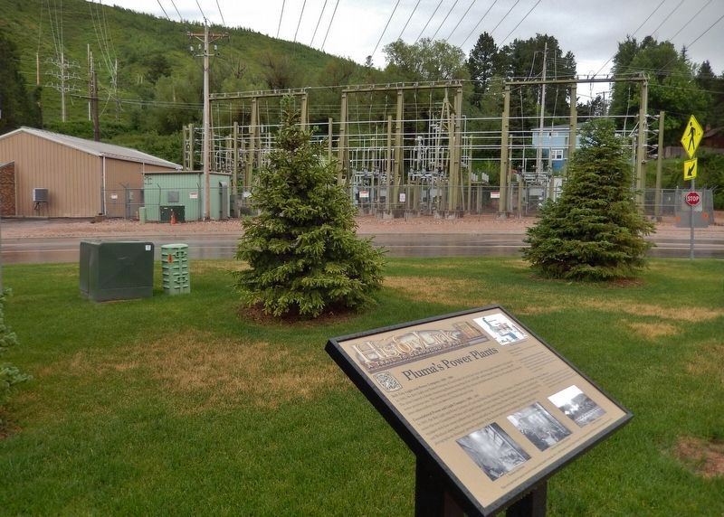 Pluma's Power Plant Marker (<i>wide view; current power substation across highway in background</i>). Click for full size. Pluma's Power Plant Marker (<i>wide view; current power substation across highway in background</i>) image. Click for full size.