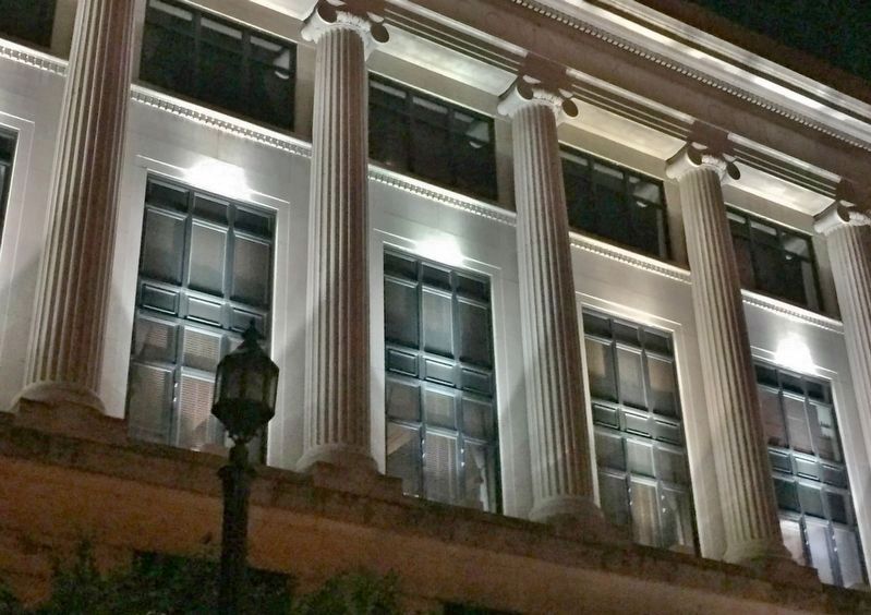 Genesee County Courthouse (<i>night view; front windows & neo-classical columns</i>). Click for full size. Genesee County Courthouse (<i>night view; front windows & neo-classical columns</i>) image. Click for full size.