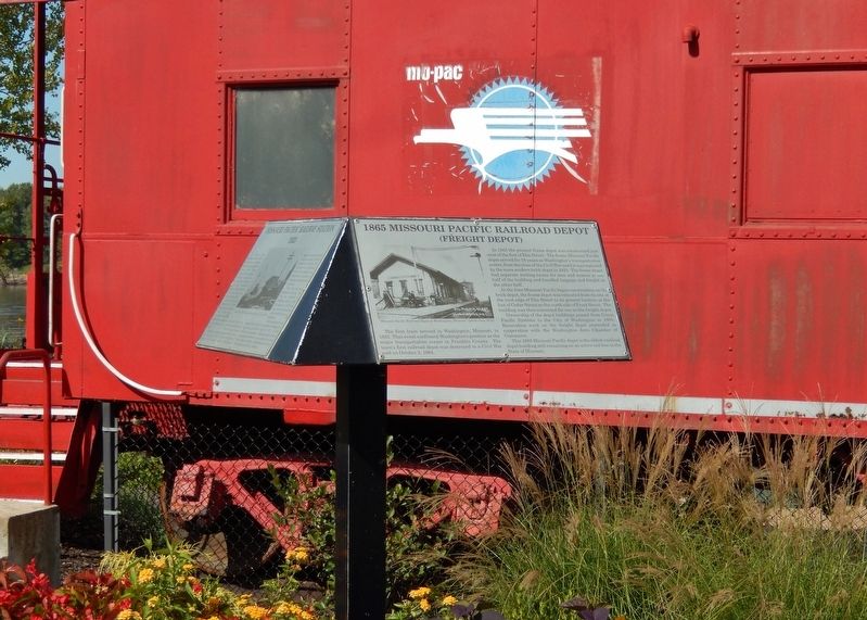 1865 Missouri Pacific Railroad Depot Marker (<i>tall view; MO-PAC caboose in background</i>) image. Click for full size.