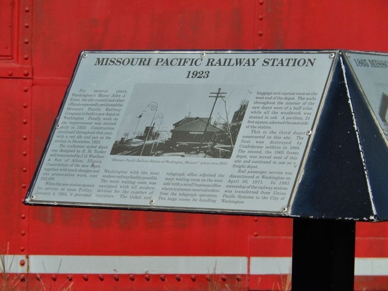 Missouri Pacific Railway Station Marker (<i>red MO-PAC caboose in background</i>). Click for full size. Missouri Pacific Railway Station Marker (<i>red MO-PAC caboose in background</i>) image. Click for full size.