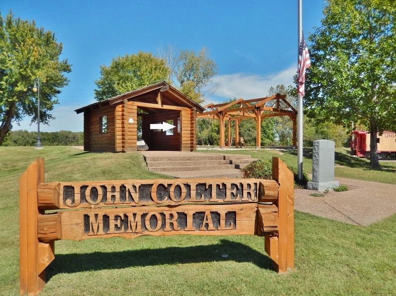 John Colter Memorial Park Sign (<i>wide view; marker visible on right wall of kiosk</i>). Click for full size. John Colter Memorial Park Sign (<i>wide view; marker visible on right wall of kiosk</i>) image. Click for full size.
