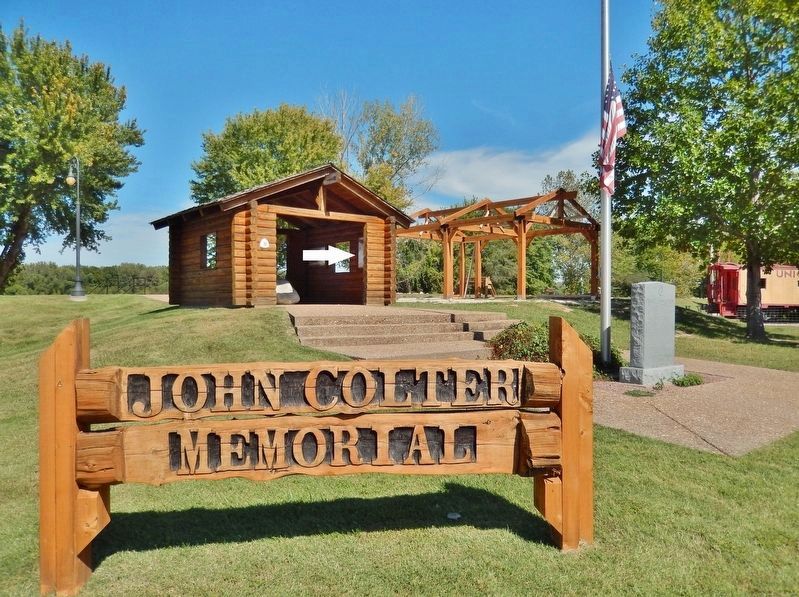 John Colter Memorial Park Sign (<i>wide view; marker visible on right wall of kiosk</i>) image. Click for full size.