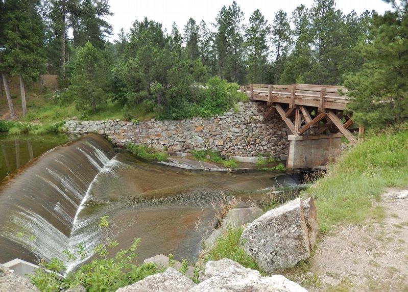 Stockade Lake Bridge (<i>wide view; showing spillway north of bridge</i>) image. Click for full size.