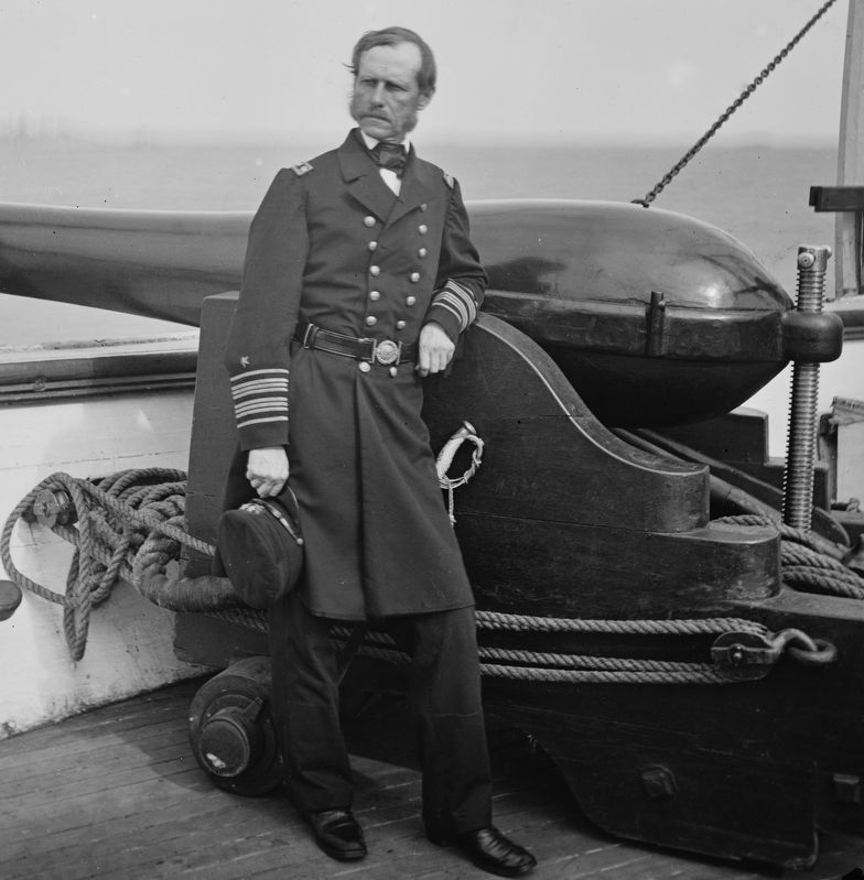 Rear Adm John A. Dahlgren standing by a Dahlgren gun on the deck of the USS Pawnee June 17, 1865. image. Click for full size.
