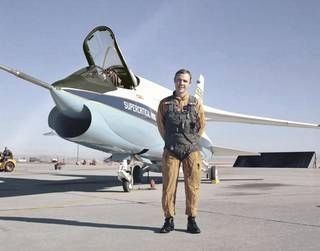 Tom McMurtry Test Pilot in front of TF-8A Crusader Supercritical Wing research vehicle. image. Click for full size.