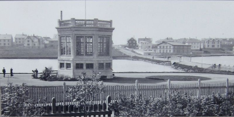 Marker detail: Photo of Hlj�msk�llinn Pavilion and Tj�rnin Lake image. Click for full size.