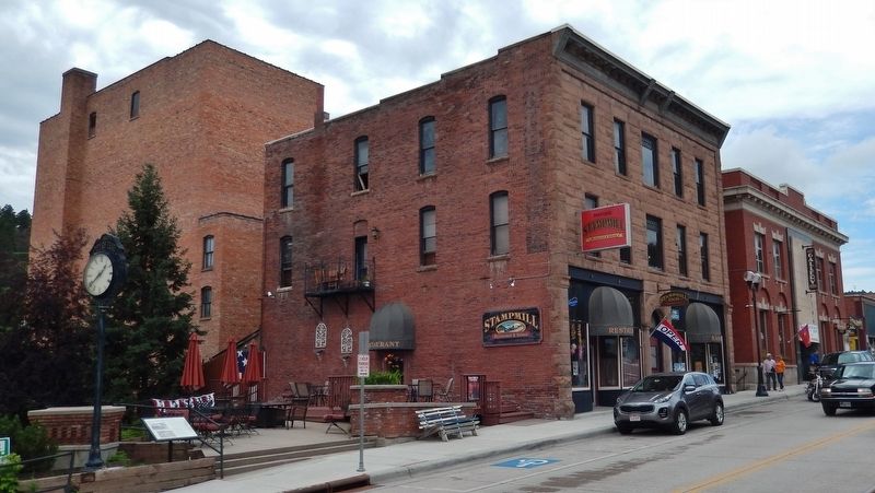 Halloran Block (<i>wide view; looking southwest from Main Street; marker at left, by clock</i>). Click for full size. Halloran Block (<i>wide view; looking southwest from Main Street; marker at left, by clock</i>) image. Click for full size.
