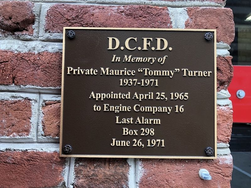 Dedication plaque on building image. Click for full size.