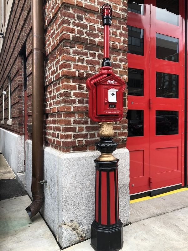 Fire call box in front of the firehouse image. Click for full size.