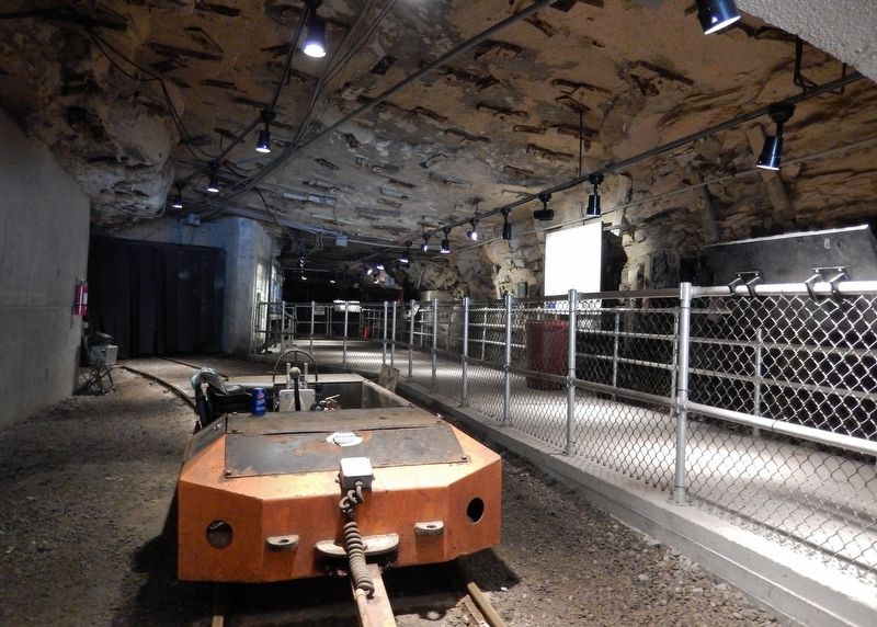 Electric trolly locomotive inside mine tunnel image. Click for full size.