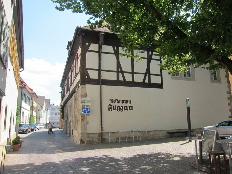 The Fuggerei building, now a restaurant - looking south on Mnstergasse image. Click for full size.
