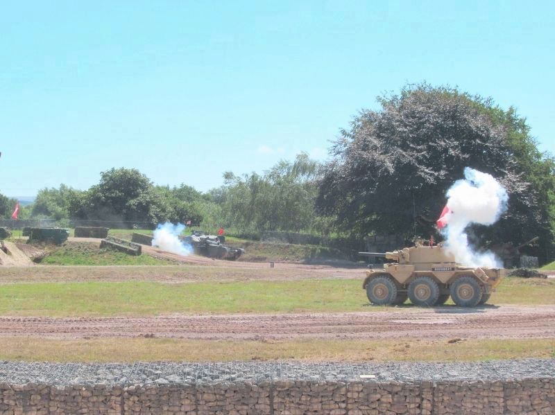 Staff members demonstrate a tank battle in the Kuwait Arena. Click for full size. Staff members demonstrate a tank battle in the Kuwait Arena image. Click for full size.