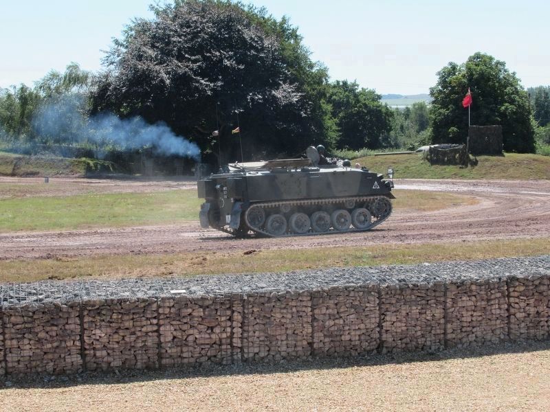 An armored personnel carrier transports young volunteers from the audience. Click for full size. An armored personnel carrier transports young volunteers from the audience image. Click for full size.
