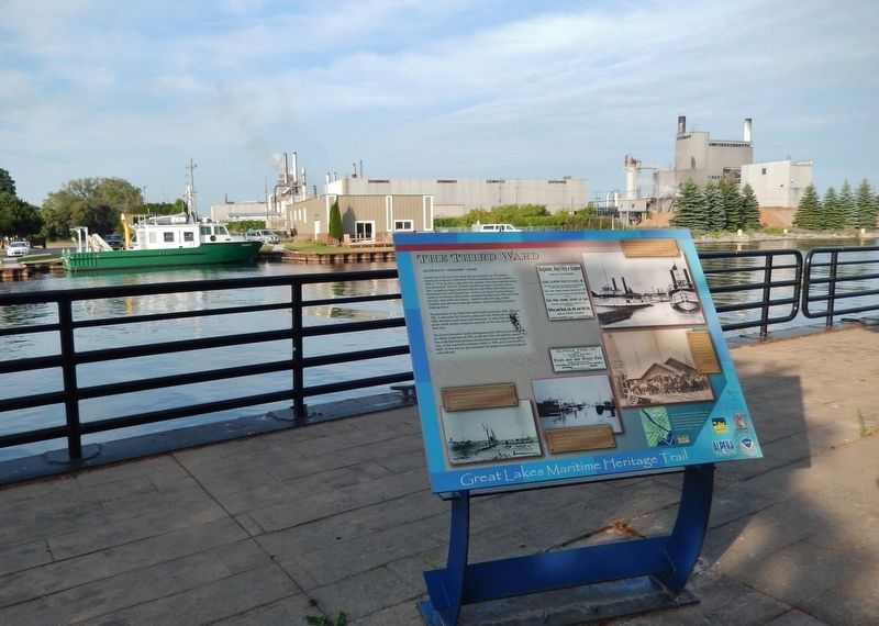 The Third Ward Marker (<i>wide view; looking north across Thunder Bay River</i>) image. Click for full size.