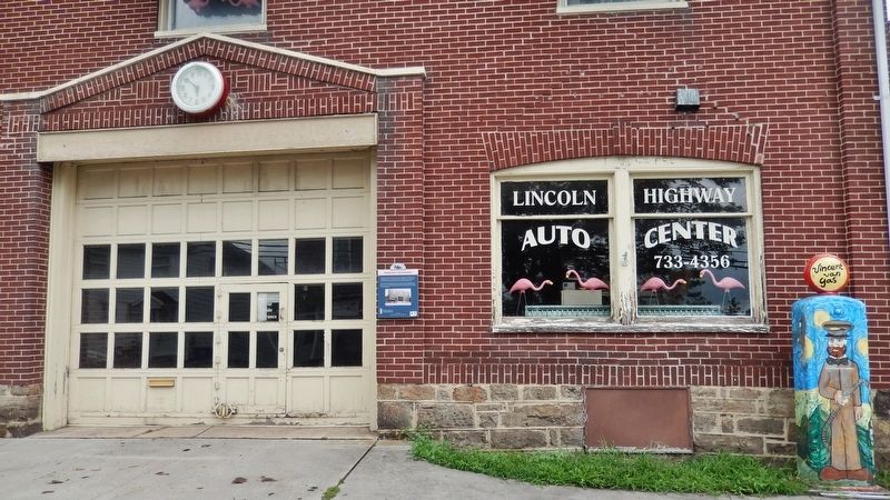 Lincoln Highway Heritage Corridor Marker (<i>wide view; marker is just right of garage door</i>) image. Click for full size.