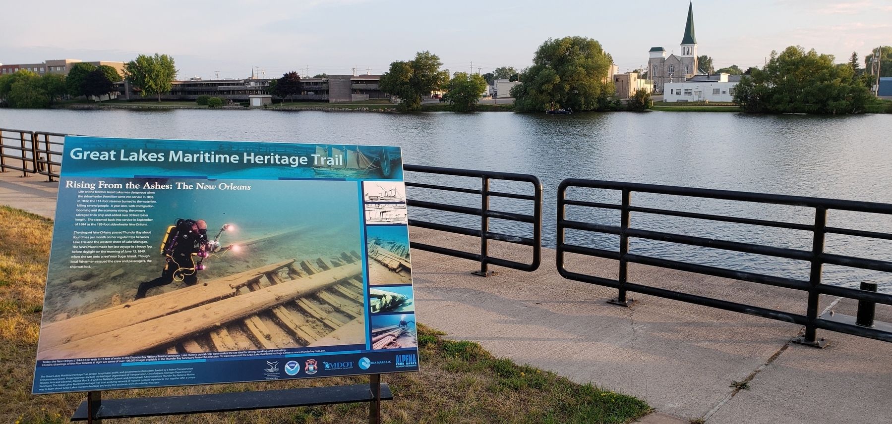 Rising from the Ashes: The <i>New Orleans</i> Marker (<i>wide view; Thunder Bay River behind</i>). Click for full size. Rising from the Ashes: The <i>New Orleans</i> Marker (<i>wide view; Thunder Bay River behind</i>) image. Click for full size.