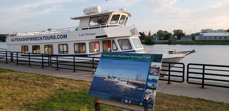 Research Vessels Marker (<i>wide view looking south across tour boat and the Thunder Bay River</i>). Click for full size. Research Vessels Marker (<i>wide view looking south across tour boat and the Thunder Bay River</i>) image. Click for full size.
