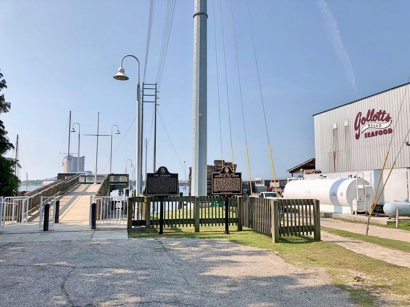 Looking across the Back Bay to Biloxi. The Crossing Marker is on the left image. Click for full size.