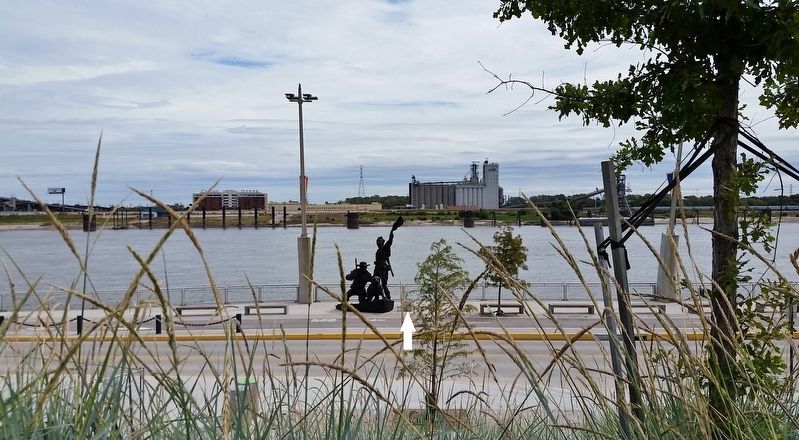 The Captains' Return Marker (<i>wide view looking east across the Mississippi River</i>) image. Click for full size.