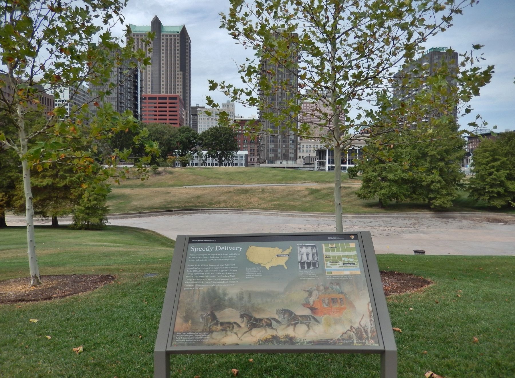 Speedy Delivery Marker (<i>wide view; looking west across park toward downtown St. Louis</i>). Click for full size. Speedy Delivery Marker (<i>wide view; looking west across park toward downtown St. Louis</i>) image. Click for full size.