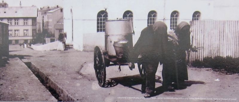 Marker detail:<i>Water-carriers on Bókhlöðustígur in the early 1900s</i>. Click for full size. Marker detail:<i>Water-carriers on Bókhlöðustígur in the early 1900s</i> image. Click for full size.
