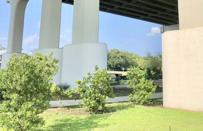 Marker can be seen in background, between the concrete pillars. image. Click for full size.