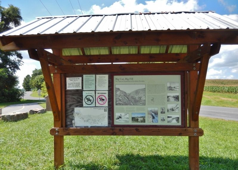Big Cut, Big Fill Marker (<i>wide view; east side of kiosk; Fairview Road in background</i>). Click for full size. Big Cut, Big Fill Marker (<i>wide view; east side of kiosk; Fairview Road in background</i>) image. Click for full size.