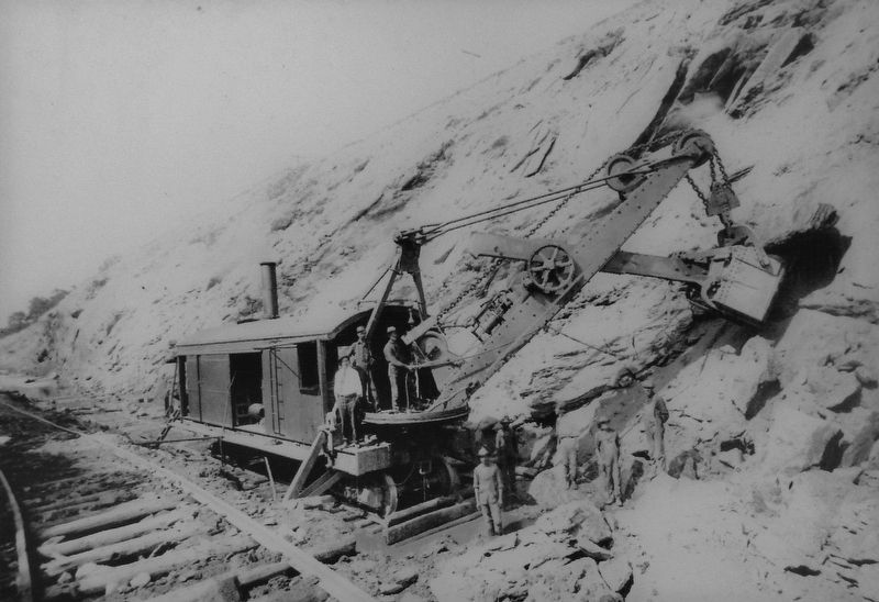 Marker detail: track-bound steam shovel. Click for full size. Marker detail: track-bound steam shovel image. Click for full size.