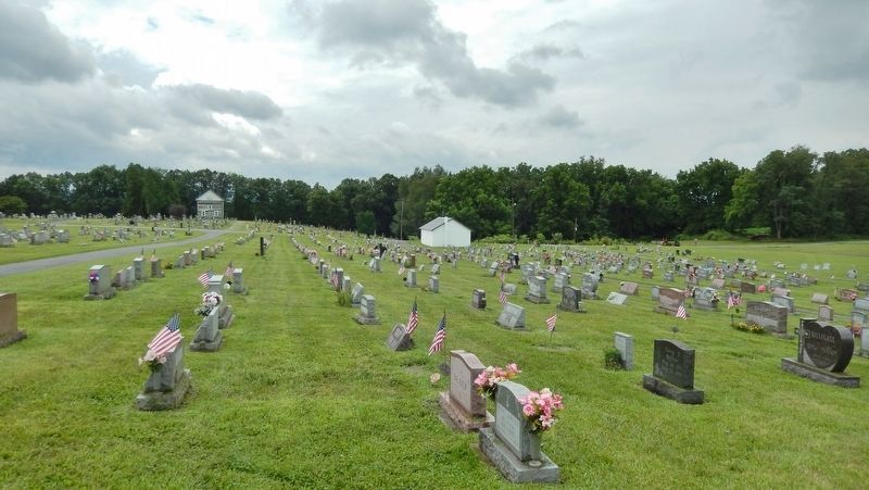 Old Log Church Cemetery (<i>view from Lincoln Highway; Old Log Chuch in background at left</i>). Click for full size. Old Log Church Cemetery (<i>view from Lincoln Highway; Old Log Chuch in background at left</i>) image. Click for full size.