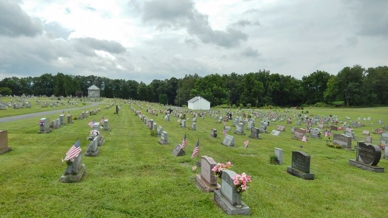 Old Log Church Cemetery (<i>view from Lincoln Highway; Old Log Chuch in background at left</i>) image. Click for full size.