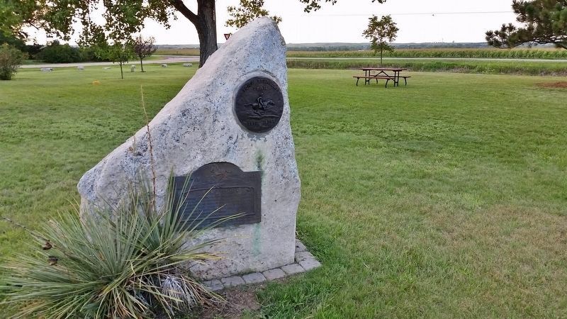 Sand Hill Station Marker (<i>wide view; showing boulder upon which the marker is mounted</i>). Click for full size. Sand Hill Station Marker (<i>wide view; showing boulder upon which the marker is mounted</i>) image. Click for full size.