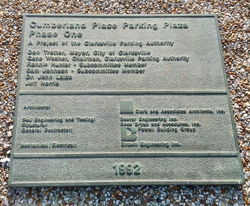 Plaque for the building of the parking plaza. image. Click for full size.
