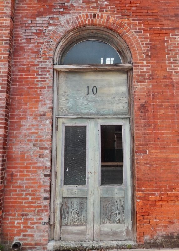 First National Bank (<i>door detail</i>) image. Click for full size.
