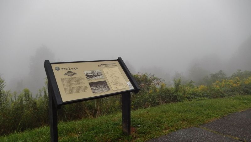 The Loops Marker (<i>wide view on a foggy day</i>). Click for full size. The Loops Marker (<i>wide view on a foggy day</i>) image. Click for full size.