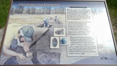 Uncovering the Expedition Marker. Click for full size. Uncovering the Expedition Marker image. Click for full size.