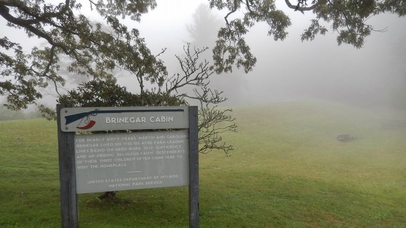 Brinegar Cabin Marker (<i>wide view; Blue Ridge Parkway in background</i>) image. Click for full size.