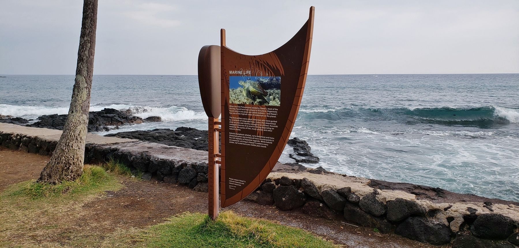 Marine Life Marker (<i>wide view; Oneo Bay in the background</i>). Click for full size. Marine Life Marker (<i>wide view; Oneo Bay in the background</i>) image. Click for full size.