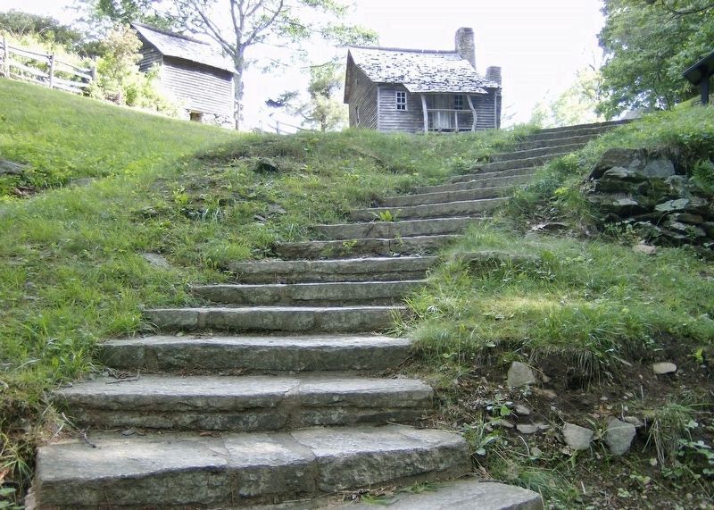 Brinegar Cabin (<i>back porch view; staircase leads down to root cellar beside spring</i>). Click for full size. Brinegar Cabin (<i>back porch view; staircase leads down to root cellar beside spring</i>) image. Click for full size.
