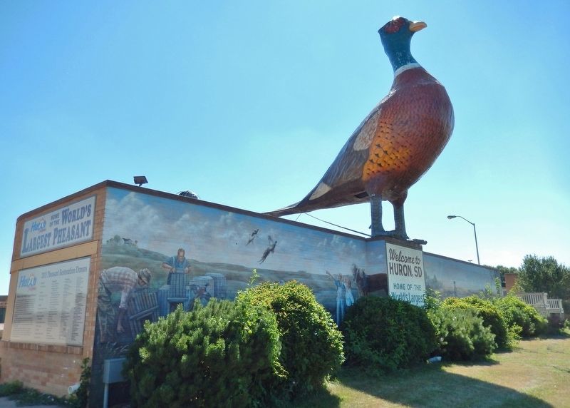 The World's Largest Pheasant (<i>wide view; showing mural underneath sculpture</i>). Click for full size. The World's Largest Pheasant (<i>wide view; showing mural underneath sculpture</i>) image. Click for full size.