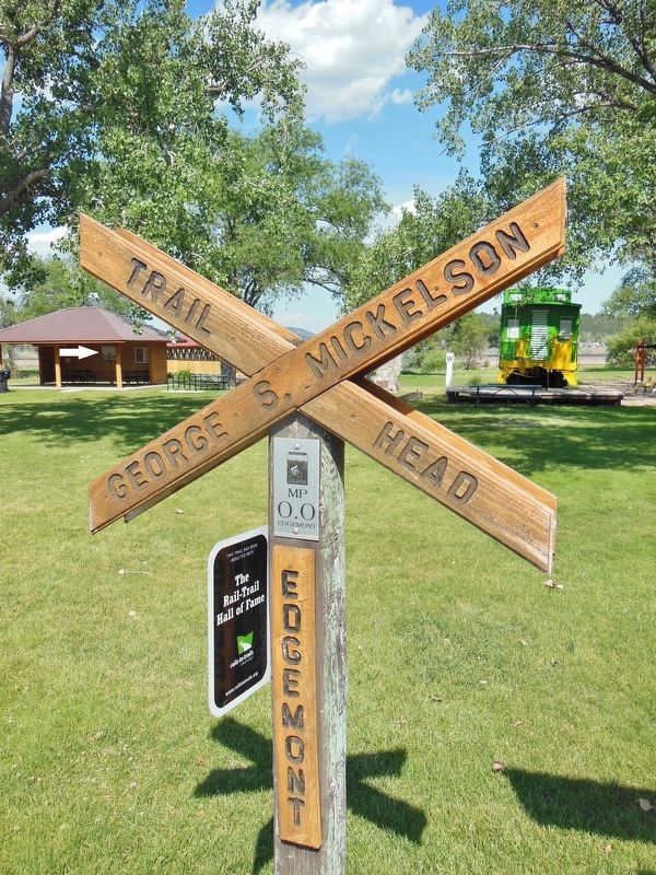 Edgemont: Where the Trail Begins Marker (<i>marker is in kiosk beyond milepost zero sign</i>). Click for full size. Edgemont: Where the Trail Begins Marker (<i>marker is in kiosk beyond milepost zero sign</i>) image. Click for full size.