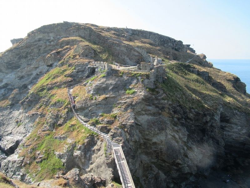 Over the bridge and up the steps to Tintagel Castle. image. Click for full size.